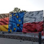 Graffiti w barwach narodowych Niemiec i Polski oraz Unii Europejskiej